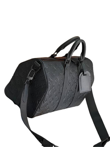 Louis Vuitton LV Keepall 35 monogram Black For Men - Banlieue91